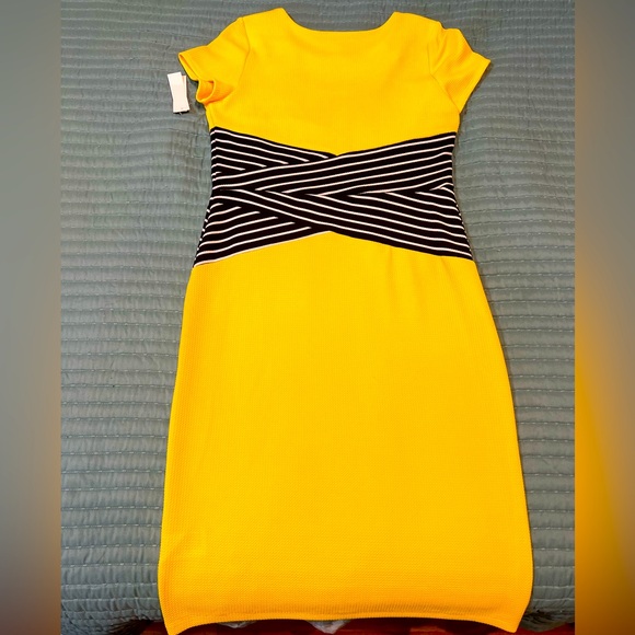 Bright and Energetic is what this dress gives. Shelby & Palmer - Picture 2 of 5